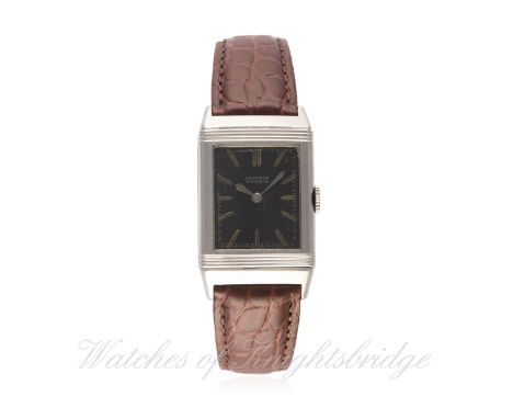 A RARE GENTLEMAN'S STAINLESS STEEL REVERSO STANDARD WRIST WATCH CIRCA 1931
D: Black dial with luminous markers & hands. M: 15