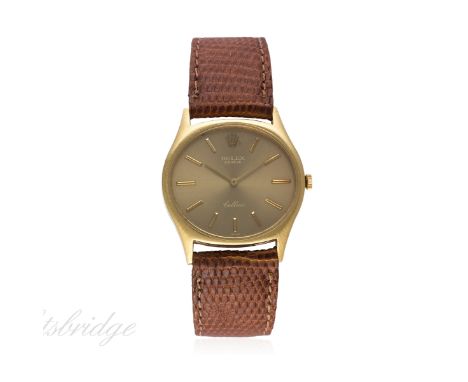A GENTLEMAN'S 18K SOLID GOLD ROLEX CELLINI WRIST WATCH CIRCA 1970, REF. 3806
D: Champagne dial with gilt batons & hands. M: 1