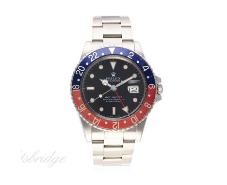 A GENTLEMAN'S STAINLESS STEEL ROLEX OYSTER PERPETUAL DATE GMT MASTER BRACELET WATCH DATED 1988, REF. 16750 "TRANSITIONAL" MOD