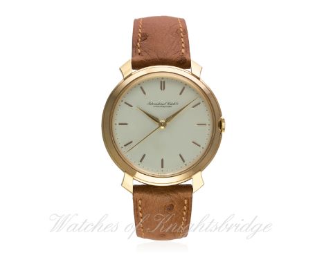 A GENTLEMAN'S LARGE SIZE 18K SOLID PINK GOLD IWC WRIST WATCH CIRCA 1950s
D: Silver dial with gilt batons & "dagger" hands. M: