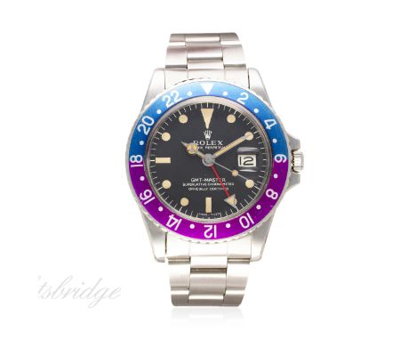 A GENTLEMAN'S STAINLESS STEEL ROLEX OYSTER PERPETUAL DATE GMT MASTER BRACELET WATCH CIRCA 1968, REF. 1675 "PINK PANTHER"
D: M