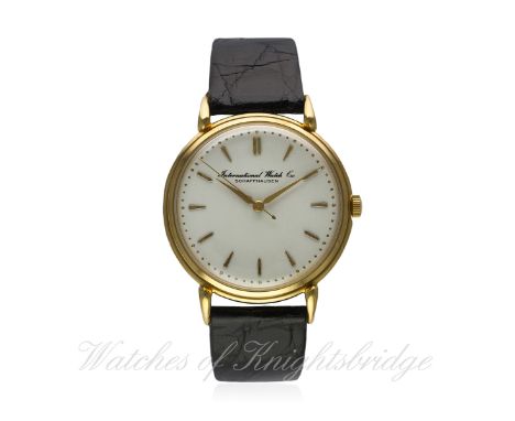 A GENTLEMAN'S LARGE SIZE 18K SOLID GOLD IWC WRIST WATCH CIRCA 1950s
D: Silver dial with gilt batons & "dagger" hands. M: Manu