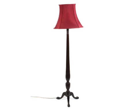 An early 20th century standard lamp with reeded column raised on a tripod base H150cm