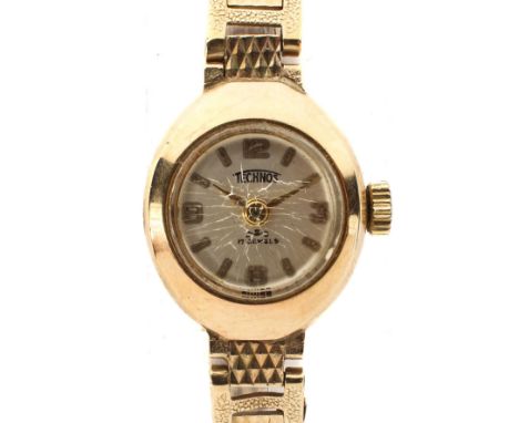 A ladies 9ct gold Technos cocktail wristwatch, the dial with batons denoting hours and quarterly Arabic markers, 17 jewel man