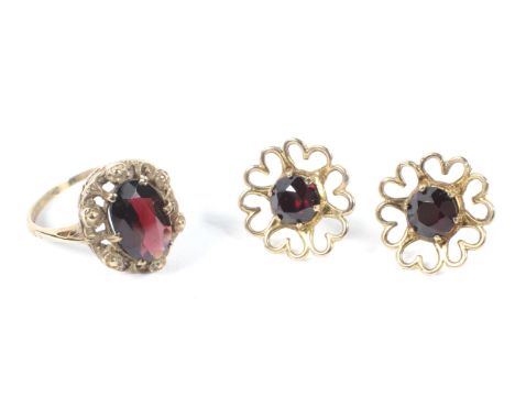 A pair of 9ct gold garnet set daisy earrings and a Victorian style garnet set dress ring, 4.9g, size L