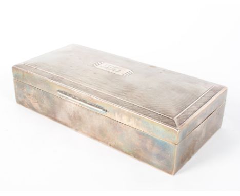 A cedar lined silver cigarette box, with engine turned decoration to the lid, monogramed GGC, maker Ernest W Haywood, Birming