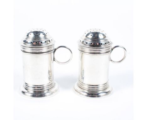 Two silver powder shakers with ring handles, maker Thomas Bradbury &amp; Sons Ltd, Sheffield, 1925, 161.8 grams