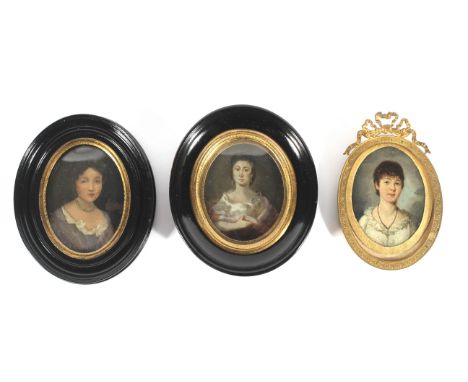 Three oval portrait miniatures of women, 19th century and later, each oil on panel, two in ebonised frames and one in giltmet
