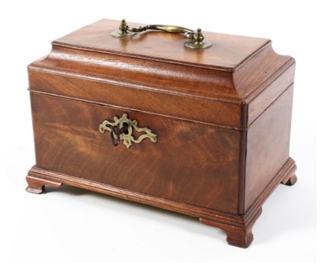 An early 20th Century mahogany three section tea caddy raised on sort shaped bracket feet, with brass carrying handle, 25cm x