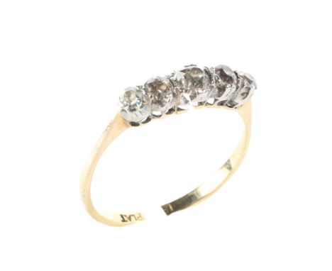 An 18ct gold and platinum five stone diamond ring, the central stone flanked by two smaller on each side, 2g(AF)