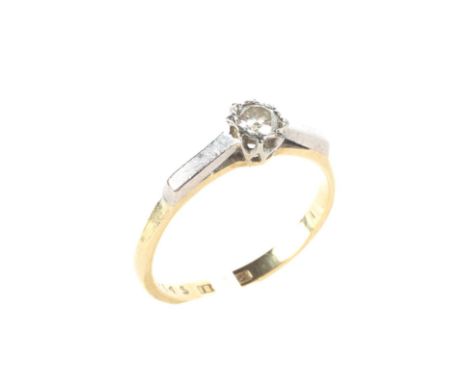 An 18ct gold and platinum set solitaire diamond ring, with raised platinum shoulders, size L, 1.8 grams