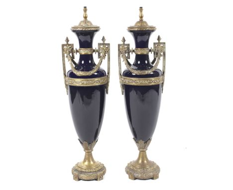 A large pair of  French neoclassical style oviform gilt-metal mounted dark-blue ground Sevres-style vases mounted as lamps, 2