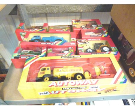 BRITAINS DIECAST VEHICLES. Shelf of boxed Britains 1:32 diecast vehicles