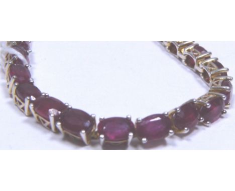 RUBY BRACELET. 14 K gold plated South African ruby bracelet, size 7,5, approximately 15 ct