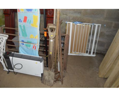 A quantity of long handled gardening tools
