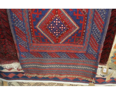 An approx. 8'2" x 2' Meshwani runner 