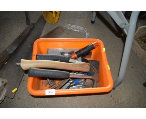 A box of various hand tools