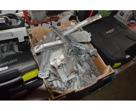 A box of galvanised gate bolts and latches