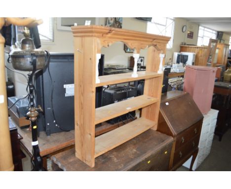 A small pine hanging shelf 