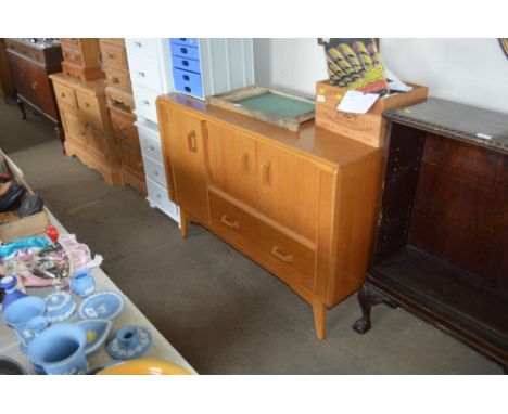 A light oak sideboard 