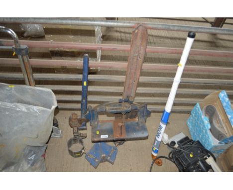 A mitre clamp; 24" Stilsons and an immersion heater spanner