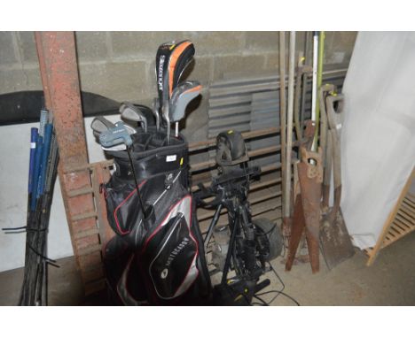A power caddy and golf bag and contents