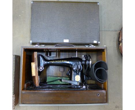 A vintage cased Singer sewing machine 
