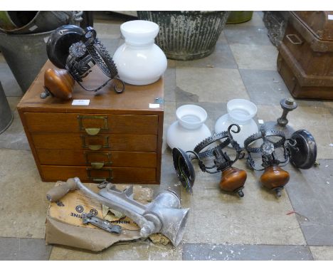 Three wall lights, a table top chest, a pewter oil lamp and a mincer 