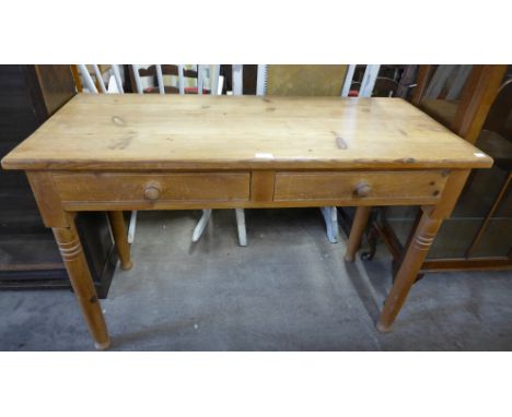 A pine two drawer console table 