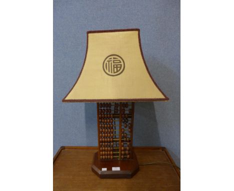 A vintage hardwood abacus table lamp 