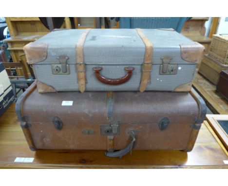 A banded travel trunk, vintage suitcase, etc. 