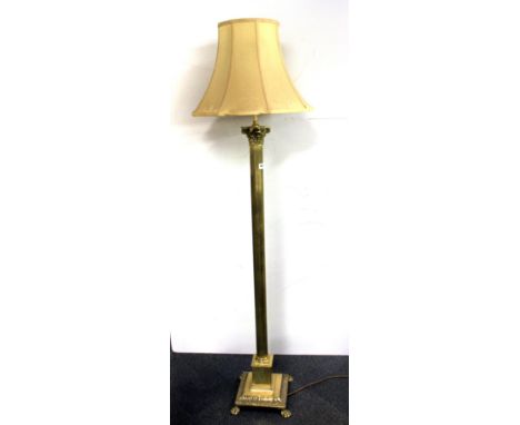 A brass column standard lamp, H. 160cm.