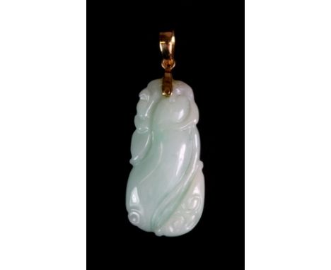 A yellow metal (tested minimum 9ct gold) mounted jade pendant.
