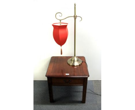 A contempory mahogany veneered table and table lamp.