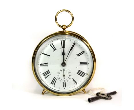 An Edwardian brass alarm clock, H. 12cm.