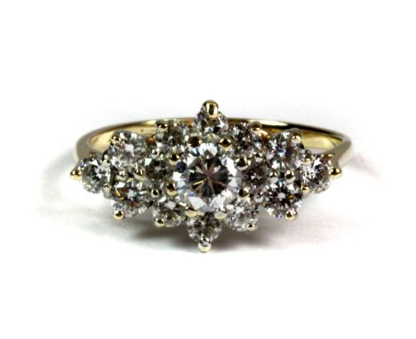 A 9ct yellow gold stone set cluster ring (K.5).