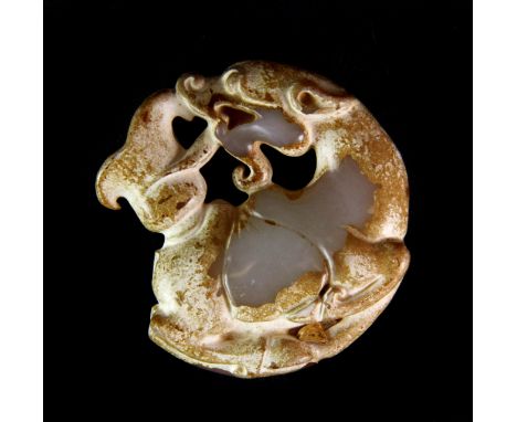 A Chinese Archaic form white jade dragon amulet, W. 5.5cm.