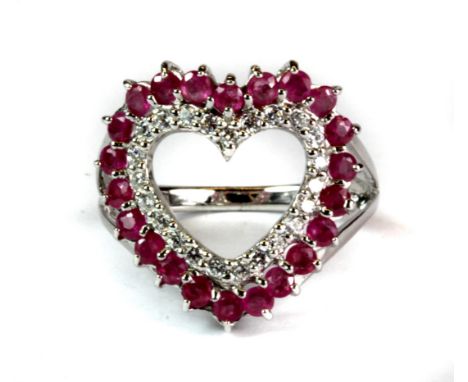 A 925 silver ruby and cubic zirconia set heart shaped ring (O).