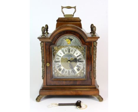A small reproduction Geogian style bracket clock by Smallcomb Clocks, H.24cm.