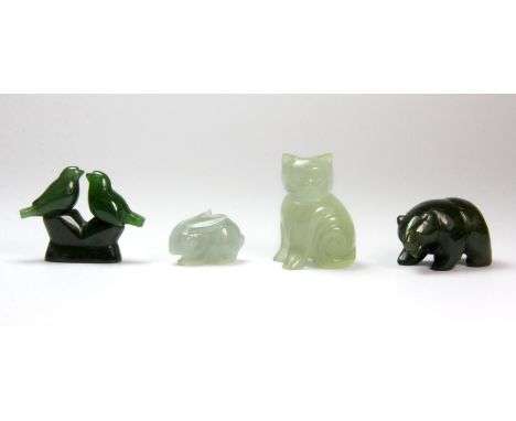 Four small jade figures of animals and birds. Cat height 4cm.