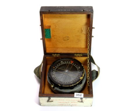 A cased Pioneer series naval compass.