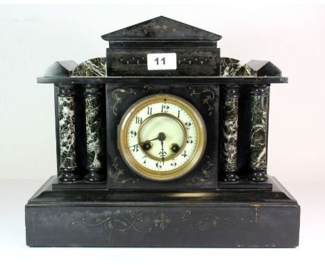 A late Victorian black and mottled marble architectural form mantle clock, raised on rectangular plinth base, H. 31cm. W. 37c