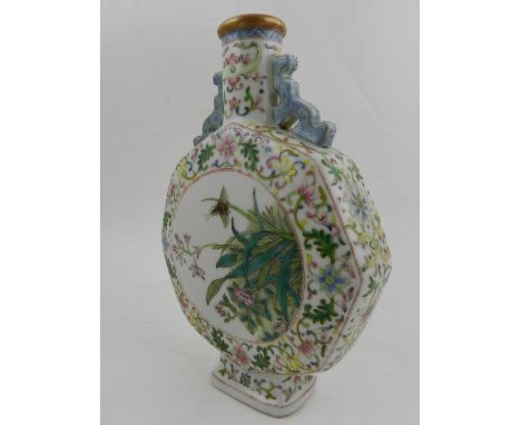 A Chinese octagonal porcelain moon flask, decorated in the famille rose pallet with flowers and foliage, bears seal mark to b