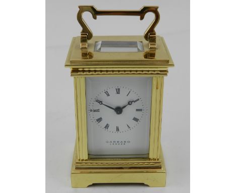 Garrard, London. A brass cased carriage clock. H.11cm