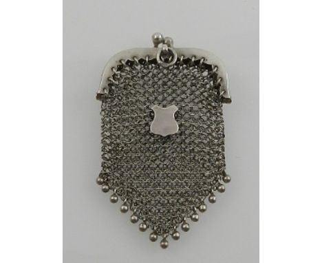 A white metal mesh miniature handbag. H.5.5cm
