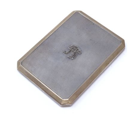 An Art Deco Asprey's silver and gilt cigarette case, canted rectangular form with engine-turned decoration, slide action hing
