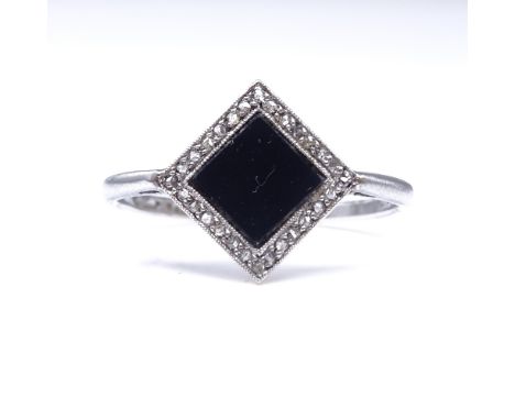 An Art Deco onyx and rose-cut diamond panel ring, platinum shank and 18ct gold settings, panel height 14mm, size approx Q, 3.