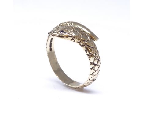 A 9ct gold snake / serpent ring, set with garnet eyes and all over engraved scales, maker's marks MP, hallmarks Birmingham 19