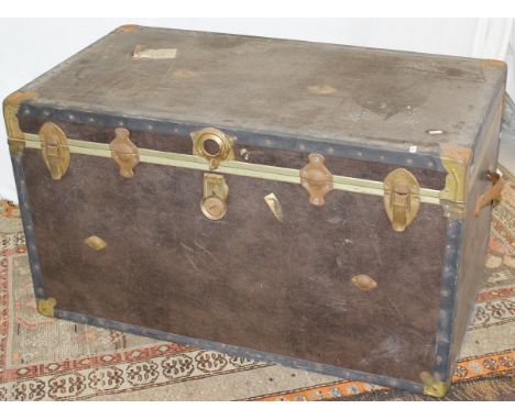 A 20th Century faux leather covered travel trunk