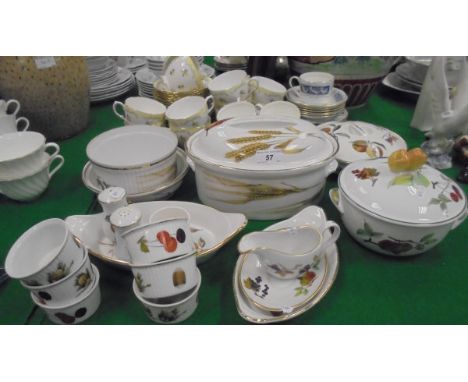 A quantity of various Royal Worcester "Evesham" pattern dinner wares including tureens, serving dishes, salt and pepper, napk